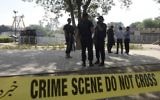 La police pakistanaise à Lahore, le 28 mars 2016, après un attentat-suicide qui a fait 72 morts. (Crédit : AFP / FAROOQ NAEEM)