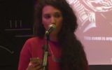 Malia Bouattia, nouvelle présidente de l'Union nationale des étudiants du Royaume-Uni, parle des "médias dirigés par des sionistes" et de la lutte armée palestinienne, en septembre 2014. (Crédit : capture d'écran YouTube/Will Lloyd)