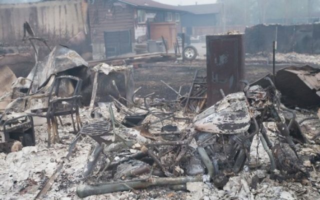 Quartier résidentiel de Fort McMurray après le passage d'un incendie, au Canada, le 7 mai 2016; (Crédit : Scott Olson/Getty Images/AFP)