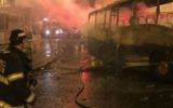 Pompiers luttant contre les flammes déclenchées par une bombe incendiaire sur une base militaire israélienne proche du mont Scopus, à Jérusalem, le 18 septembre 2015. (Crédit : capture d'écran Deuxième chaîne)