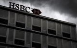 Les nuages s'accumulent au-dessus de la banque suisse HSBC, dans le centre de Genève, le 14 juin 2013. (Crédit : AFP/Fabrice Coffrini)