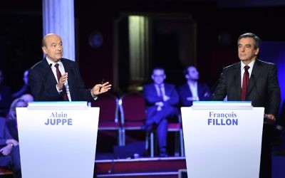 François Fillon (d) et Alain Juppé (g) lors d'un débat le 3 novembre 2016 (Crédit :  AFP / Eric FEFERBERG)