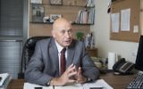 Basel Ghattas, député de la Liste arabe unie, dans son bureau de la Knesset à Jérusalem, le 3 novembre 2015. (Crédit : Hadas Parush/Flash90)