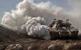 Un tank Merkava de l'armée israélienne près de la frontière avec la Syrie sur le plateau du Golan, le 28 novembre 2016. (Crédit : Jack Guez/AFP)