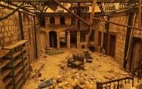 Le quartier détruit de Bab al-Nasr à Alep, autrefois aux mains des rebelles, pendant une tempête de sable, le 10 mars 2017. (Crédit : Joseph Eid/AFP)