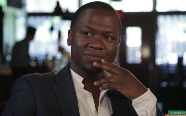 Juan Thompson, 31 ans, de St. Louis, soupçonné d'avoir menacé au moins huit institutions juives américaines début 2017. (Crédit : capture d'écran BricTV) Juan Thompson, 31 ans, de St. Louis, soupçonné d'avoir menacé au moins huit institutions juives américaines début 2017. (Crédit : capture d'écran BricTV)