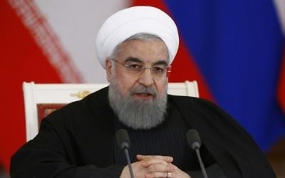 Le président iranien Hassan Rouhani lors d'une conférence de presse conjointe avec son homologue russe, au Kremlin, à Moscou, le 28 mars 2017. (Crédit : Sergei Karpukhin/Pool/AFP)