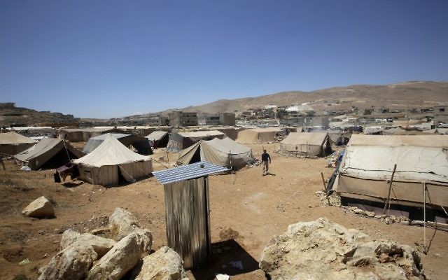 Camp de réfugiés syriens d'Arsaal, au Liban, le 14 juin 2013. Illustration. (Crédit : Joseph Eid/AFP) Camp de réfugiés syriens d'Arsaal, au Liban, le 14 juin 2013. Illustration. (Crédit : Joseph Eid/AFP)