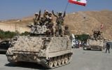 Soldats libanais à Ras Baalbek, après leur retour du front contre l'Etat islamique, le 21 août 2017. (Crédit : Stringer/AFP)