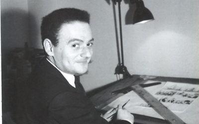 René Goscinny à sa table de dessin. (Crédit :Anne Goscinny. Prêt de l’institut René Goscinny , via le Musée d'art et d'histoire du judaïsme)