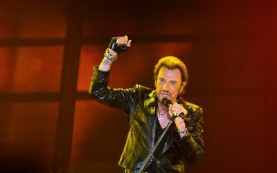 Johnny Hallyday, le 2 JUIN 2013 sur scène à Bordeaux. (Crédit : AFP /ARCHIVES / NICOLAS TUCAT)