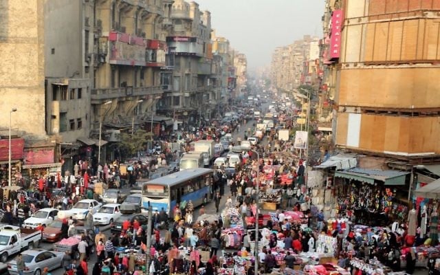A picture taken on December 12, 2017 shows an elevated view of al-Attaba district on the edge of downtown Cairo, Egypt.
Egypt is the most populated coutry in the Arab world with some 96 million inhabitants and the numbers are rising by 1.6 million every year.  / AFP PHOTO / MOHAMED EL-SHAHED