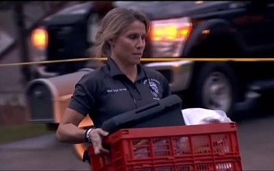 La police de l'État de Virginie récolte les preuves de la maison des Fricker, à Reston, où Scott et son épouse Buckley Kuhn-Fricker ont été abattus le 22 décembre 2017. (Crédit : capture d'écran NBC Washington News)