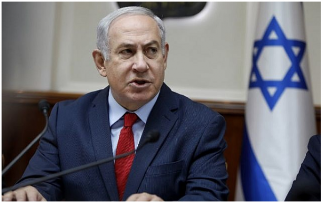 Le Premier ministre Benjamin Netanyahu lors de la réunion hebdomadaire du cabinet dans ses bureaux de Jérusalem, le 31 décembre 2017 (AFP PHOTO / POOL / GALI TIBBON) Le Premier ministre Benjamin Netanyahu lors de la réunion hebdomadaire du cabinet dans ses bureaux de Jérusalem, le 31 décembre 2017 (AFP PHOTO / POOL / GALI TIBBON)