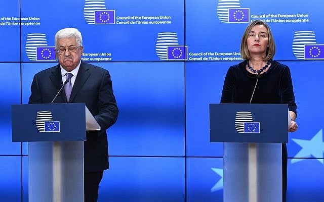 Palestinian President Mahmoud Abbas (L) speaks as EU foreign policy chief Federica Mogherini listens prior to attend a EU foreign affairs council at the European Council in Brussels, January 22, 2018. Palestinian leader Mahmud Abbas on January 22 urged EU member states to "swiftly" grant official recognition to the state of Palestine as he arrived to meet foreign ministers from the bloc in Brussels.
EMMANUEL DUNAND / AFP Palestinian President Mahmoud Abbas (L) speaks as EU foreign policy chief Federica Mogherini listens prior to attend a EU foreign affairs council at the European Council in Brussels, January 22, 2018. Palestinian leader Mahmud Abbas on January 22 urged EU member states to "swiftly" grant official recognition to the state of Palestine as he arrived to meet foreign ministers from the bloc in Brussels.
EMMANUEL DUNAND / AFP