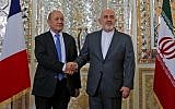 Le ministre iranien des Affaires étrangères, Mohammad Javad Zarif (à droite), serre la main du ministre français des Affaires étrangères, Jean-Yves Le Drian, lors de leur rencontre à Téhéran, capitale de l'Iran, le 5 mars 2018. (AFP / ATTA KENARE)