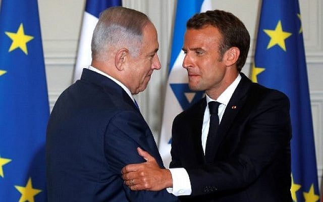 Emmanuel Macron et Benjamin Netanyahu pendant une conférence de presse conjointe au Palais de l'Elysée, le 5 juin 2018. (Crédit : PHILIPPE WOJAZER/AFP) Emmanuel Macron et Benjamin Netanyahu pendant une conférence de presse conjointe au Palais de l'Elysée, le 5 juin 2018. (Crédit : PHILIPPE WOJAZER/AFP)