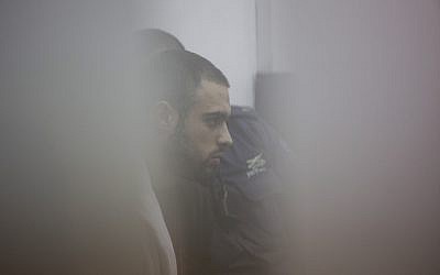 L'agent de la police des frontières Ben Deri, qui a été plus tard condamné pour l'homicide d'un adolescent palestinien de 17 ans dans la ville de Beitunia, en Cisjordanie, lors d'une audience à huis-clos à la cour de district de Jérusalem, le 7 décembre 2014 (Crédit : Yonatan Sindel/Flash90)