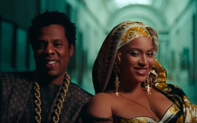 Jay-Z and Beyonce grinning toward the end of their video, ‘Apeshit – The Carters’, produced by Jerusalemite Natan Schottenfels (YouTube screenshot)