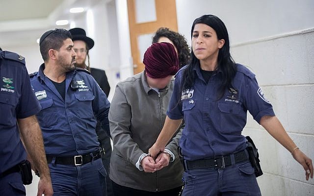 L'ancienne directrice d'école en Australie Malka Leifer, recherchée dans son pays pour agressions sexuelles contre des enfants, à la cour de district de Jérusalem, le 14 février 2018. (Crédit : Yonatan Sindel/Flash90) L'ancienne directrice d'école en Australie Malka Leifer, recherchée dans son pays pour agressions sexuelles contre des enfants, à la cour de district de Jérusalem, le 14 février 2018. (Crédit : Yonatan Sindel/Flash90)