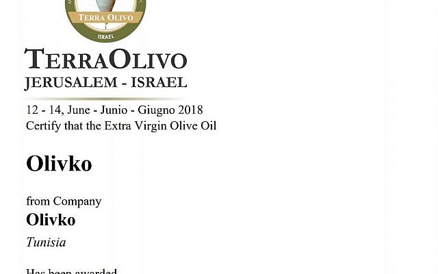 Capture d'écran du certificat de médaille d'or obtenu par la compagnie tunisienne Olivko lors du concours TerraOlivo (Crédit: capture d'écran Terraolivo.org)