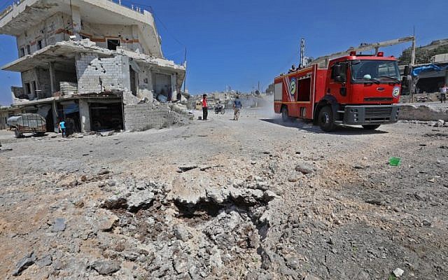 La ville rebelle de Muhambal,dans la province d'Idleb, le 4 septembre 2018, ravagée après une frappe attribuée à la Russie. (Crédit : AFP / OMAR HAJ KADOUR) La ville rebelle de Muhambal,dans la province d'Idleb, le 4 septembre 2018, ravagée après une frappe attribuée à la Russie. (Crédit : AFP / OMAR HAJ KADOUR)