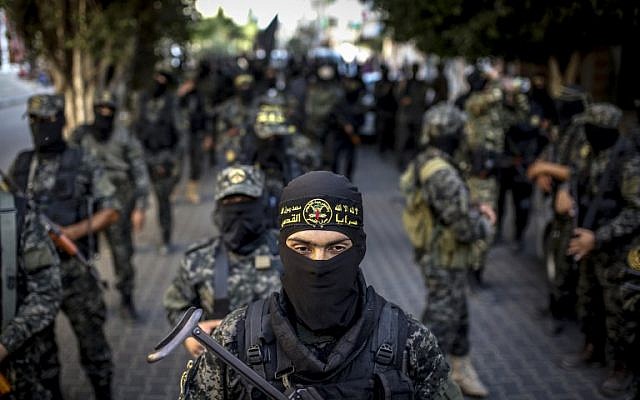 Une parade militaire du Jihad islamique, à Gaza, le 4 octobre 2016. (Crédit : AFP / Anas BABA)