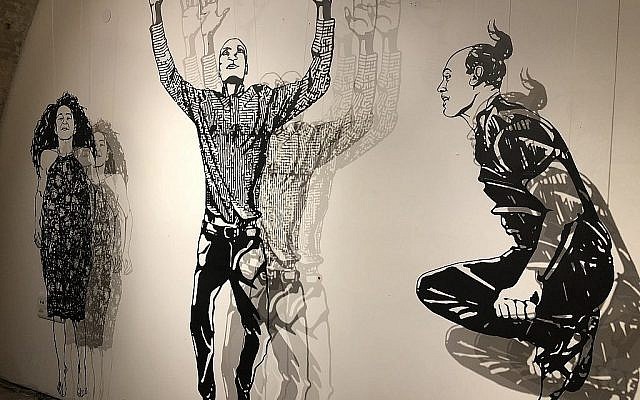 Les figurines coupées au laser de Michal Bachar qui créent des ombres en noir et blanc lors de la Semaine de l'Illustration 2018 (Crédit : Jessica Steinberg/Times of Israel)