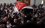 Funérailles de Mohammed Abu Diab, un garde du corps de l'ancien ministre libanais Wiam Wahhab, proche du groupe terroriste chiite libanais du Hezbollah, décédé des suites de ses blessures lors d'un raid de la police au domicile de ce dernier, à Beyrouth, le 2 décembre 2018. (Crédit : Mustafa JAMALEDDINE / AFP)