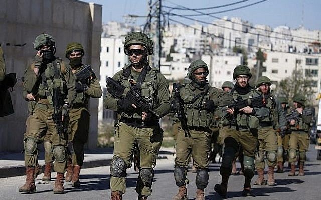 Les soldats israéliens à Ramallah, le 15 décembre 2018 (Crédit : ABBAS MOMANI / AFP)