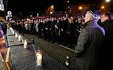 Hommage aux victimes de la prise d'otages de l'HyperCacher de Vincennes, le 9 janvier 2019. (Crédit : FRANCOIS GUILLOT / AFP)