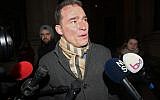 L'avocat belge de Mehdi Nemmouche, Sebastien Courtoy répond aux journalistes au Palais de justice de Bruxelles, le 18 janvier 2019, (Crédit : JOHN THYS / AFP)