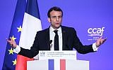 Le président français Emmanuel Macron durant le dîner annuel du Conseil de coordination des organisations arméniennes de France (CCAF), le 5 février à Paris. (Crédit : LUDOVIC MARIN / POOL / AFP)
