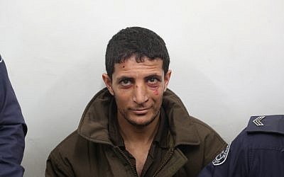 Arafat Irfayia, accusé du meurtre d'Ori Ansbacher, à la Cour des magistrats de Jérusalem, le 11 février 219. (Crédit : Yonatan Sindel/Flash90)