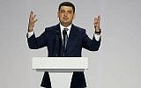 Le Premier ministre ukrainien Volodymyr Groysman gesticule alors qu’il s’exprime lors d’une rencontre avec des soutiens du président ukrainien Petro Poroshenko à Kiev, en Ukraine, le mardi 29 janvier 2019. (AP Photo/Efrem Lukatsky)