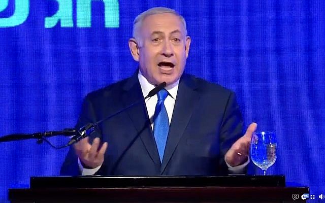 Le Premier ministre Benjamin Netanyahu prend la parole lors d'un événement du Likud à l'occasion de Hanoukka, le 2 décembre 2018. (Capture d'écran : Facebook) Le Premier ministre Benjamin Netanyahu prend la parole lors d'un événement du Likud à l'occasion de Hanoukka, le 2 décembre 2018. (Capture d'écran : Facebook)