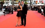 Le réalisateur américain Quentin Tarantino et sa femme, la chanteuse israélienne Daniella Pick, au festival de Cannes, le 18 mai 2019. (Crédit photo : Valery HACHE / AFP)