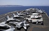 Vue générale du pont du porte-avions américain USS George H. W. Bush, amarré au large du port de Haïfa, le 3 juillet 2017. (AFP Photo/AFP Photo et Pool/Ronen Zvulun)