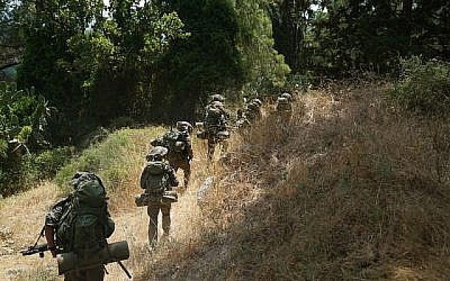 Des soldats israéliens participent à un exercice militaire d'envergure contre le groupe terroriste du Hezbollah, au Liban, en juin 2019. (Crédit : armée israélienne) Des soldats israéliens participent à un exercice militaire d'envergure contre le groupe terroriste du Hezbollah, au Liban, en juin 2019. (Crédit : armée israélienne)
