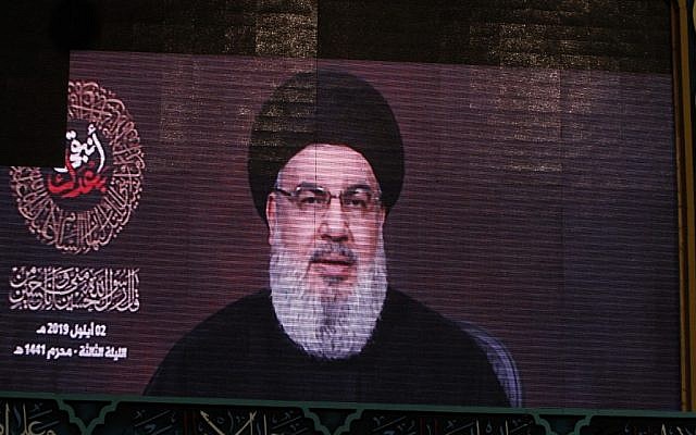 Un discours du leader du mouvement chiite libanais du Hezbollah, Hasan Nasrallah, est retransmis sur grand écran dans la banlieue sud de Beyrouth, la capitale libanaise, le 2 septembre 2019. (AFP) Un discours du leader du mouvement chiite libanais du Hezbollah, Hasan Nasrallah, est retransmis sur grand écran dans la banlieue sud de Beyrouth, la capitale libanaise, le 2 septembre 2019. (AFP)