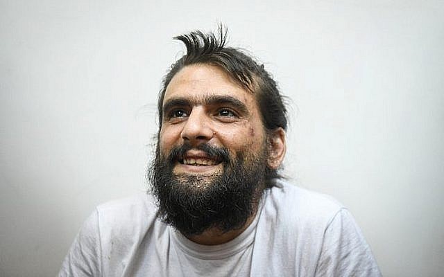 Le fondateur de Telegrass, Amos Dov Silver, comparaît devant le tribunal de première instance de Rishon Lezion pour une audience de renvoi le 18 août 2019, après avoir été extradé d'Ukraine vers Israël. (Avi Dishi/Flash90) Le fondateur de Telegrass, Amos Dov Silver, comparaît devant le tribunal de première instance de Rishon Lezion pour une audience de renvoi le 18 août 2019, après avoir été extradé d'Ukraine vers Israël. (Avi Dishi/Flash90)