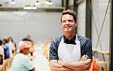 David Hertz est le co-fondateur de 
Gastromotiva, une organisation qui lutte contre le chômage et les inégalités sociales. (Crédit : Charles Bronfman Prize via JTA)