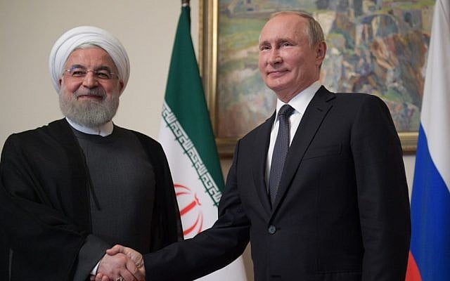 Le président russe Vladimir Poutine (à droite) serre la main du président iranien Hassan Rouhani lors d'une réunion du Supreme Eurasian Economic Council à Erevan, le 1er octobre 2019. (Crédit : Alexei Druzhinin/Sputnik/AFP) Le président russe Vladimir Poutine (à droite) serre la main du président iranien Hassan Rouhani lors d'une réunion du Supreme Eurasian Economic Council à Erevan, le 1er octobre 2019. (Crédit : Alexei Druzhinin/Sputnik/AFP)