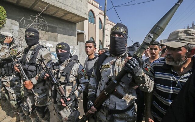 Les terroristes du Jihad islamique palestinien lors des funérailles de l'un de leurs membres, à Khan Younès, dans le sud de la bande de Gaza, le 14 novembre 2019 (Crédit : SAID KHATIB / AFP) Les terroristes du Jihad islamique palestinien lors des funérailles de l'un de leurs membres, à Khan Younès, dans le sud de la bande de Gaza, le 14 novembre 2019 (Crédit : SAID KHATIB / AFP)