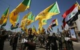 Des combattants chiites irakiens des brigades du Hezbollah soutenues par l'Iran défilent lors d'un défilé militaire à Bagdad le 31 mai 2019. (Photo AHMAD AL-RUBAYE / AFP)