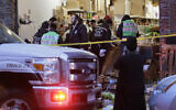Des urgentistes travaillent dans un supermarché casher, lieu d'une fusillade à Jersey City, N.J., le mercredi 11 décembre 2019. (AP/Seth Wenig)