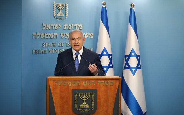 Le Premier ministre Benjamin Netanyahu tient une conférence de presse au bureau du Premier ministre à Jérusalem, le 25 mars 2020. (Crédit : Olivier Fitoussi/Flash90) Le Premier ministre Benjamin Netanyahu tient une conférence de presse au bureau du Premier ministre à Jérusalem, le 25 mars 2020. (Crédit : Olivier Fitoussi/Flash90)
