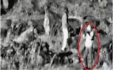 Une personne filme Israël depuis la zone tampon entre la Syrie et Israël dans ce qui, selon l'armée, était une préparation d'attaque de sniper, comme le montre une photo de surveillance publiée par l'armée le 17 mars 2020. (Crédit : armée israélienne)