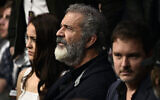 Mel Gibson à un événement de l'UFC avec sa compagne Rosalind Ross à Las Vegas, le 14 décembre 2019. (Chris Unger/Zuffa LLC/Getty Images via JTA)