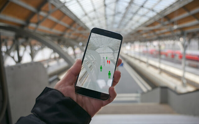 Une application existante pour smartphone qui traque la propagation de l'infection au coronavirus en déterminant les contacts avec les personnes infectées (Crédit : iStock)